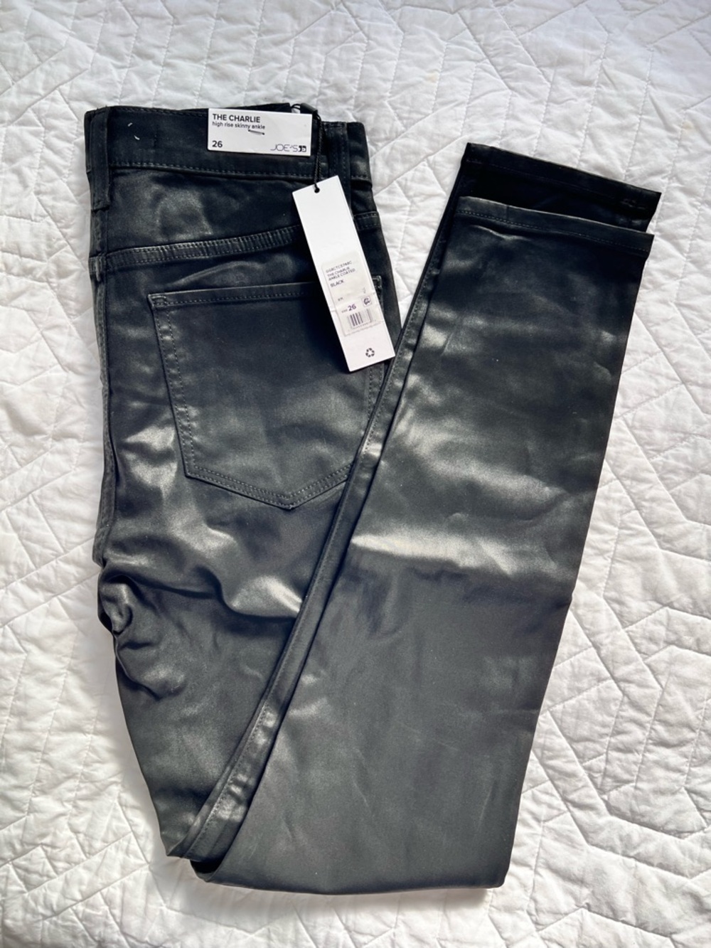 Joe's jeans. The Charlie Coated Skinny Ankle Jeans in Black. Size 26. New w/tags